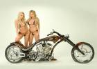Две девушки в купальнике у мотоцикла