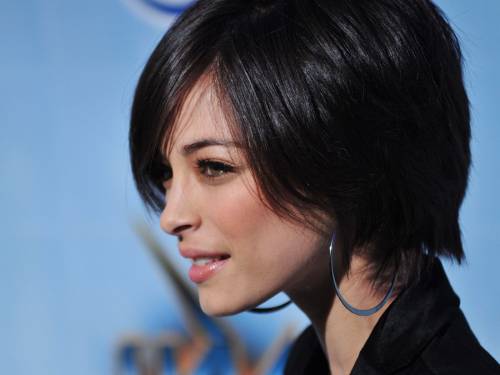 Kristin Kreuk ( Кристин Кройк ) на синем фоне